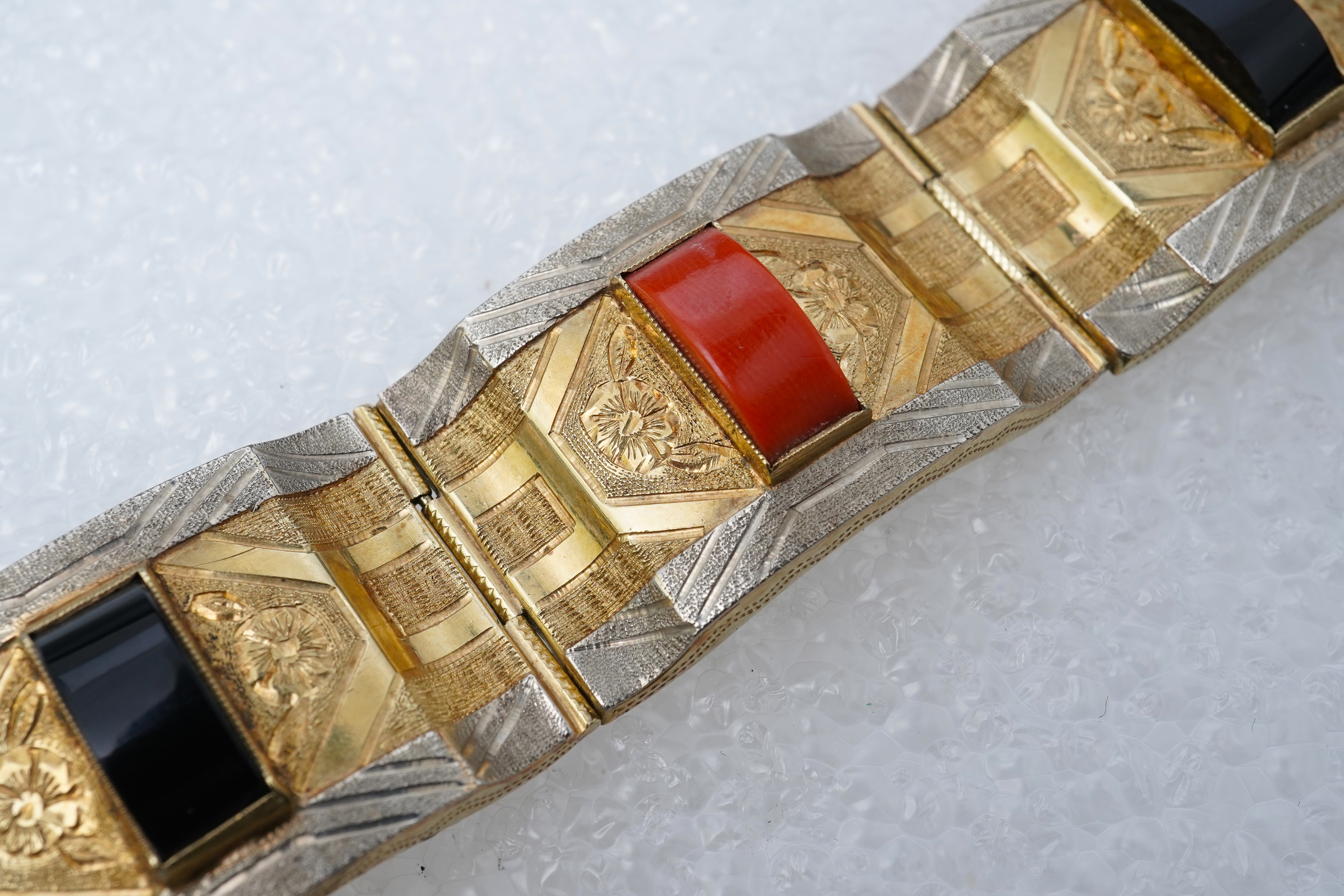 A gold, coral and onyx bracelet, Austria, mid 20th century